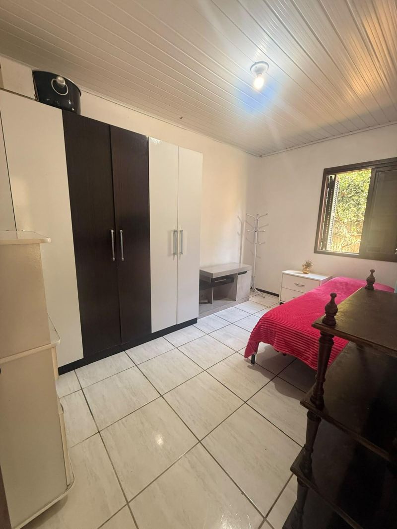 Taquara: Casa com Vista Deslumbrante em Área Residencial Alta