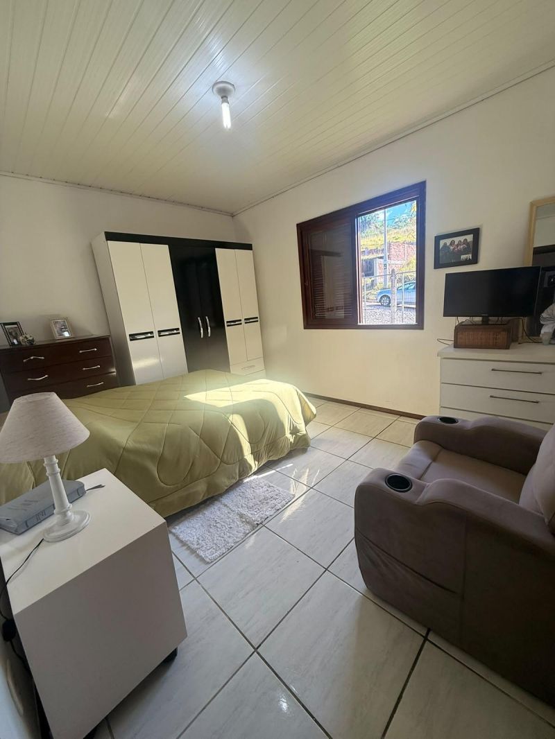 Taquara: Casa com Vista Deslumbrante em Área Residencial Alta
