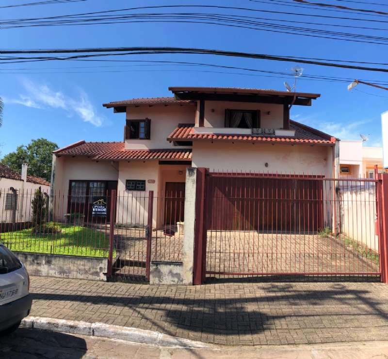 Casa Alvenaria com 4 quartos e 3 banheiros à venda no bairro Centro, Taquara