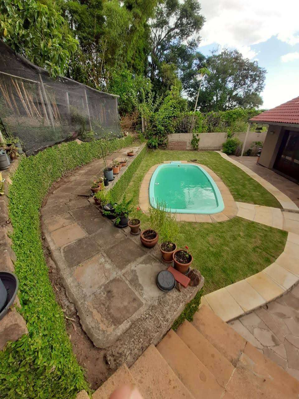 Casa Alvenaria com 4 quartos, 3 banheiros e 208m² à venda no bairro Centro, Taquara