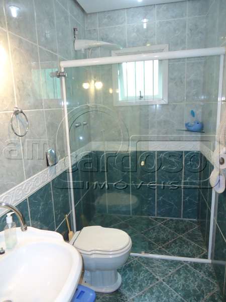 Casa com 3 quartos, 2 banheiros e 110m² à venda no bairro Sarandi, Porto Alegre