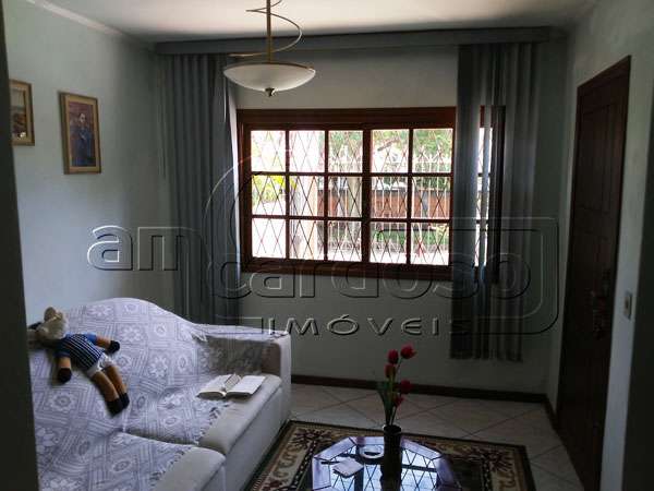Casa com 2 quartos, 3 banheiros e 75m² à venda no bairro Sarandi, Porto Alegre