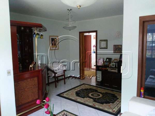 Casa com 2 quartos, 3 banheiros e 75m² à venda no bairro Sarandi, Porto Alegre