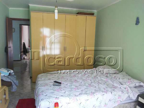 Casa com 2 quartos, 3 banheiros e 75m² à venda no bairro Sarandi, Porto Alegre