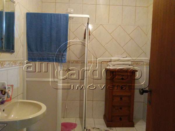 Casa com 2 quartos, 3 banheiros e 75m² à venda no bairro Sarandi, Porto Alegre