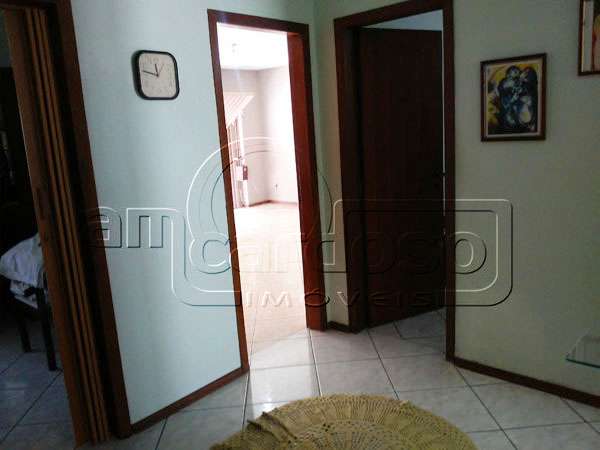 Casa com 2 quartos, 3 banheiros e 75m² à venda no bairro Sarandi, Porto Alegre