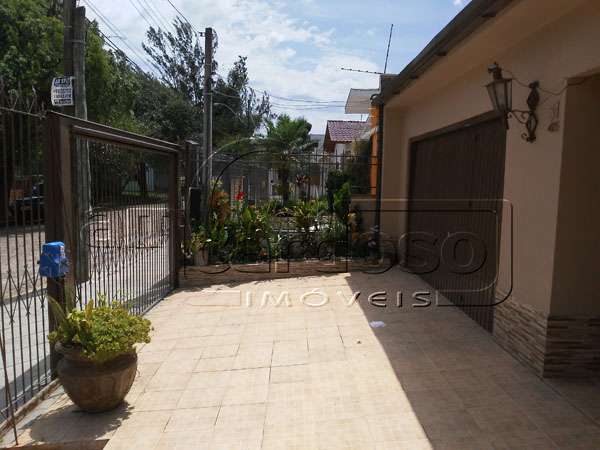 Casa com 2 quartos, 3 banheiros e 75m² à venda no bairro Sarandi, Porto Alegre