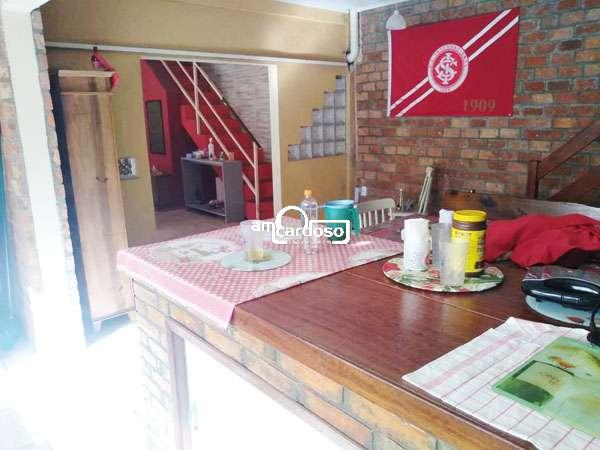 Sobrado com 2 quartos, 2 banheiros e 150m² à venda no bairro Jardim Lindoia, Porto Alegre