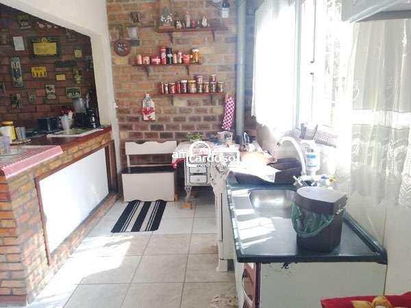 Sobrado com 2 quartos, 2 banheiros e 150m² à venda no bairro Jardim Lindoia, Porto Alegre