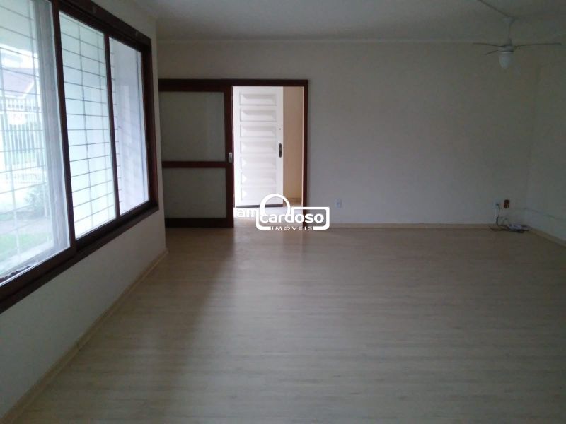 Casa com 5 quartos, 4 banheiros e 360m² à venda no bairro Jardim Lindoia, Porto Alegre