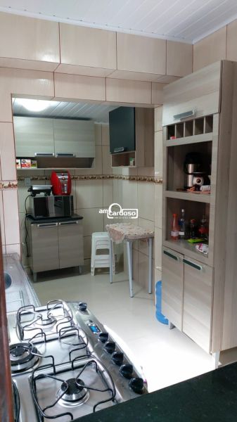 Casa com 2 quartos, 3 banheiros e 240m² à venda no bairro Rubem Berta, Porto Alegre