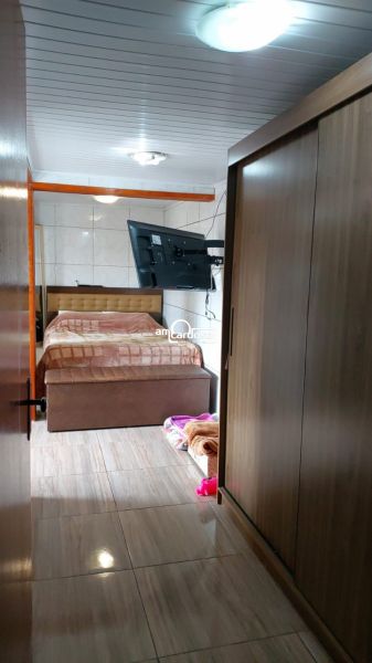 Casa com 2 quartos, 3 banheiros e 240m² à venda no bairro Rubem Berta, Porto Alegre