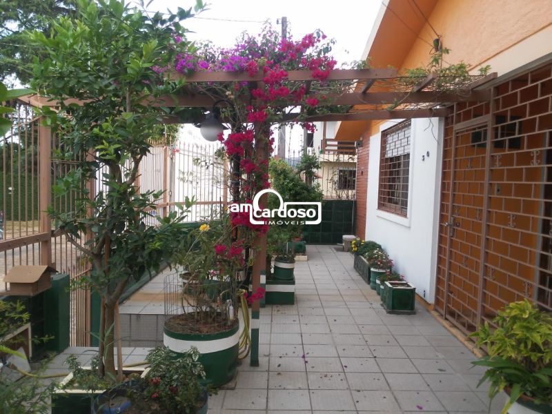 Casa com 3 quartos, 3 banheiros e 147m² à venda no bairro Parque Santa Fé, Porto Alegre