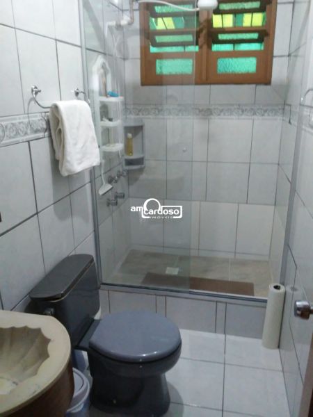 Casa com 3 quartos, 3 banheiros e 147m² à venda no bairro Parque Santa Fé, Porto Alegre