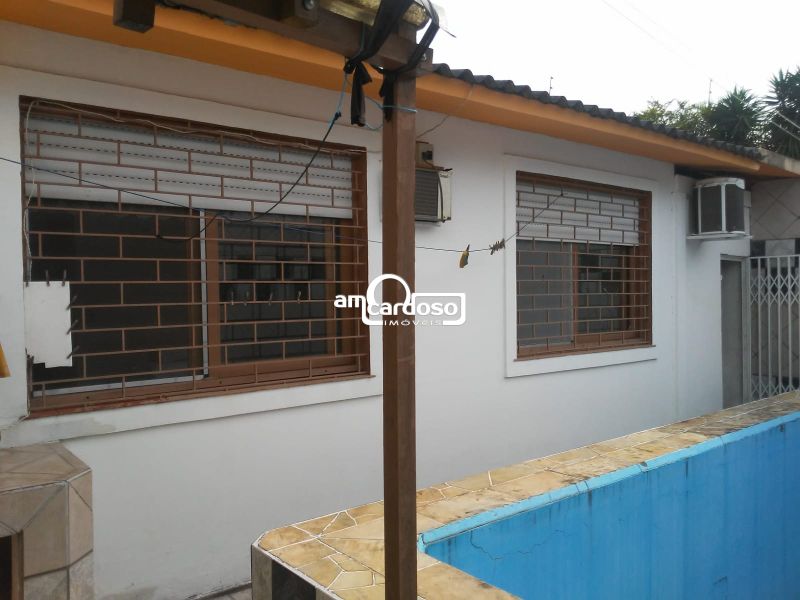 Casa com 3 quartos, 3 banheiros e 147m² à venda no bairro Parque Santa Fé, Porto Alegre
