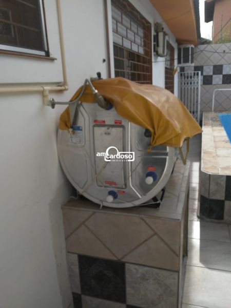 Casa com 3 quartos, 3 banheiros e 147m² à venda no bairro Parque Santa Fé, Porto Alegre