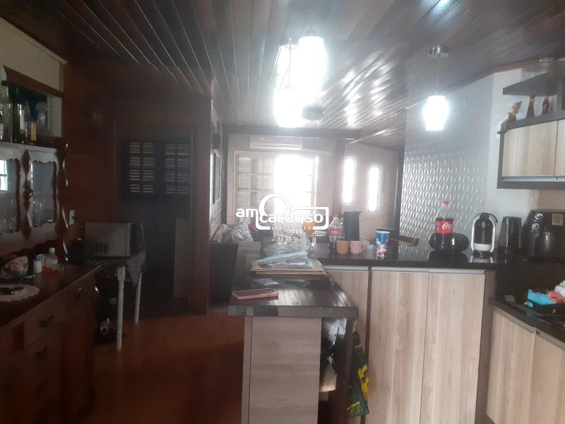 Casa com 3 quartos, 3 banheiros e 110m² à venda no bairro Parque dos Mayas, Porto Alegre