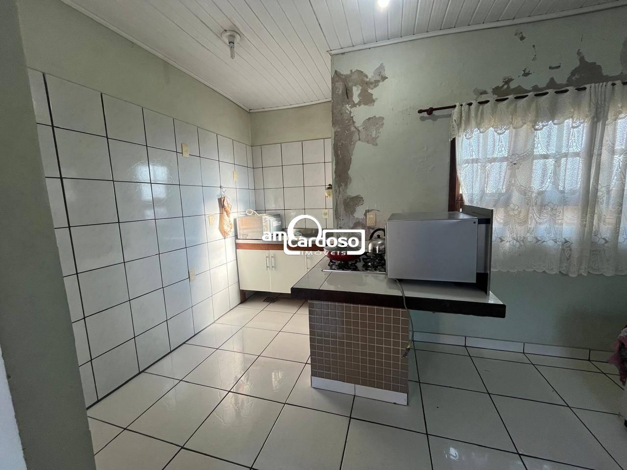 Casa com 4 quartos, 2 banheiros e 153m² à venda no bairro Bom Sucesso, Gravatai