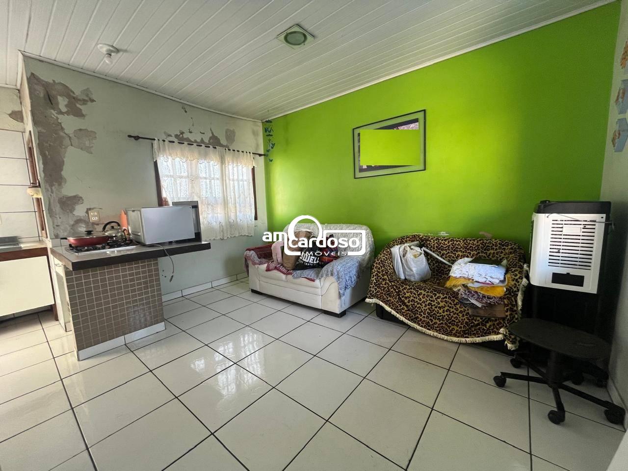 Casa com 4 quartos, 2 banheiros e 153m² à venda no bairro Bom Sucesso, Gravatai