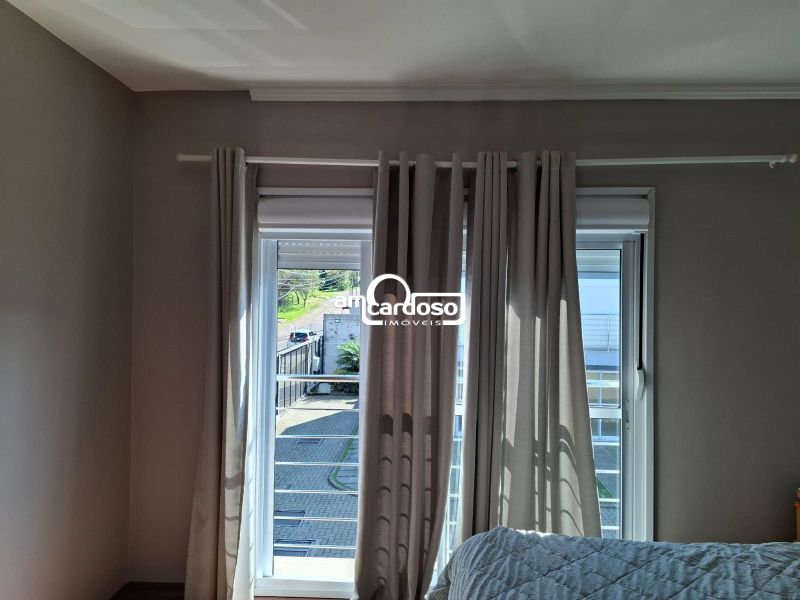 Sobrado com 2 quartos, 2 banheiros e 118m² à venda no bairro Parque Santa Fé, Porto Alegre