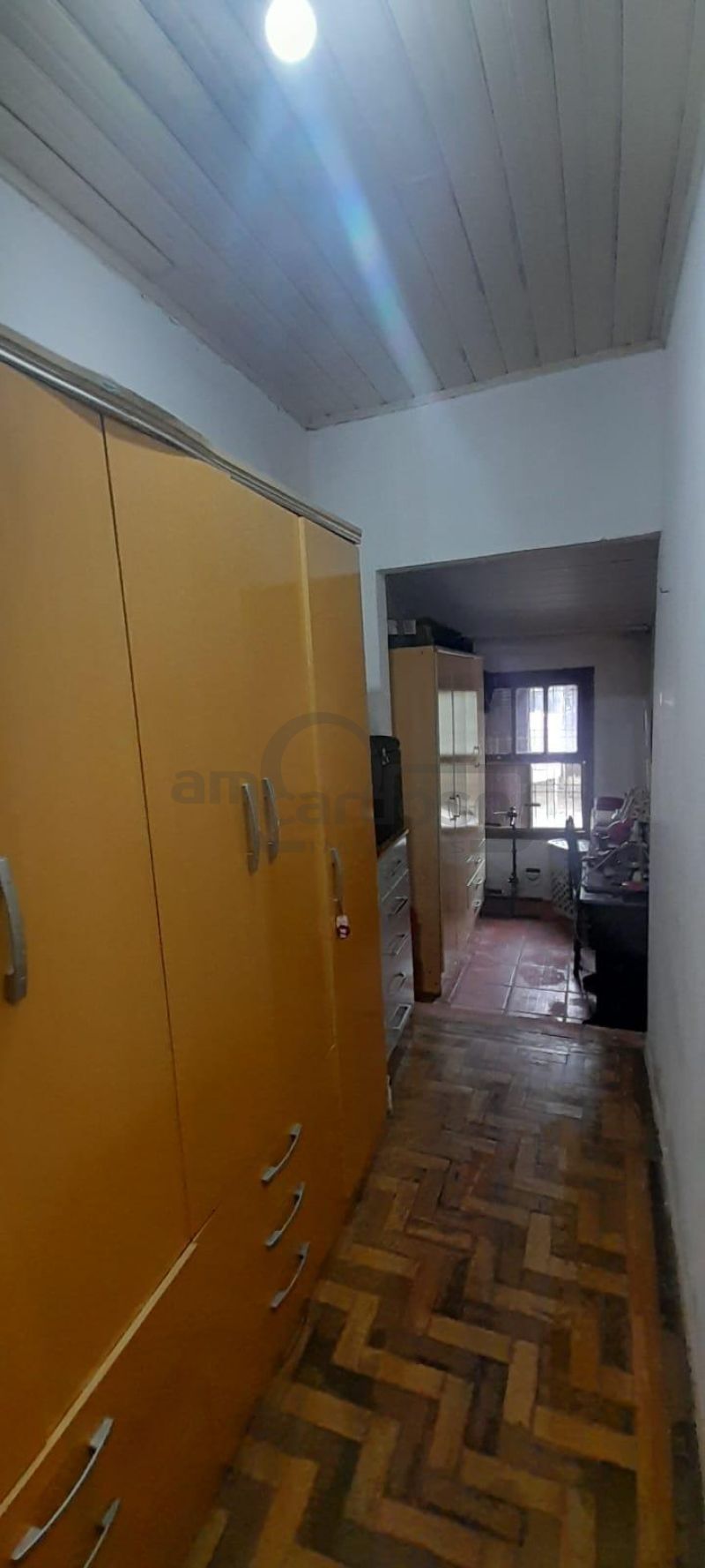 RESIDÊNCIA COM 2 DORMITÓRIOS, TÉRREA, COMPACTA, EM LOCALIZAÇÃO PRIVILEGIADA DO PARQUE MINUANO