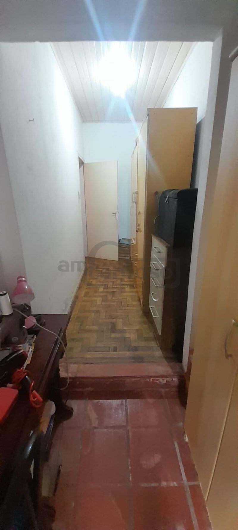 RESIDÊNCIA COM 2 DORMITÓRIOS, TÉRREA, COMPACTA, EM LOCALIZAÇÃO PRIVILEGIADA DO PARQUE MINUANO