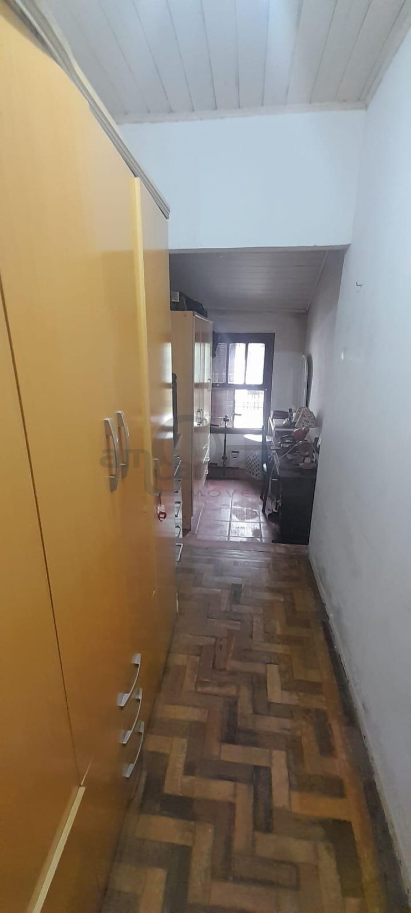 RESIDÊNCIA COM 2 DORMITÓRIOS, TÉRREA, COMPACTA, EM LOCALIZAÇÃO PRIVILEGIADA DO PARQUE MINUANO