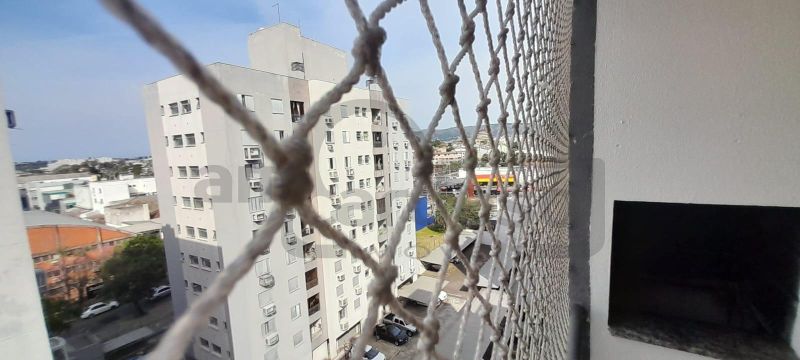 APARTAMENTO COM 2 DORMITÓRIOS, SACADA COM CHURRASQUEIRA E ESTACIONAMENTO