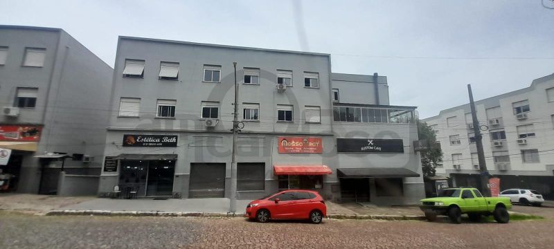 APARTAMENTO COM DOIS DORMITÓRIOS E ESTACIONAMENTO CONDOMINIAL