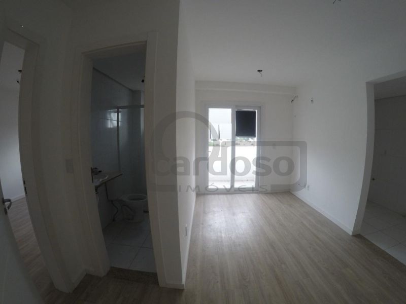 APARTAMENTO DE 1 DORMITÓRIO, SACADA COM CHURRASQUEIRA, GARAGEM COBERTA, INFRA COMPLETA