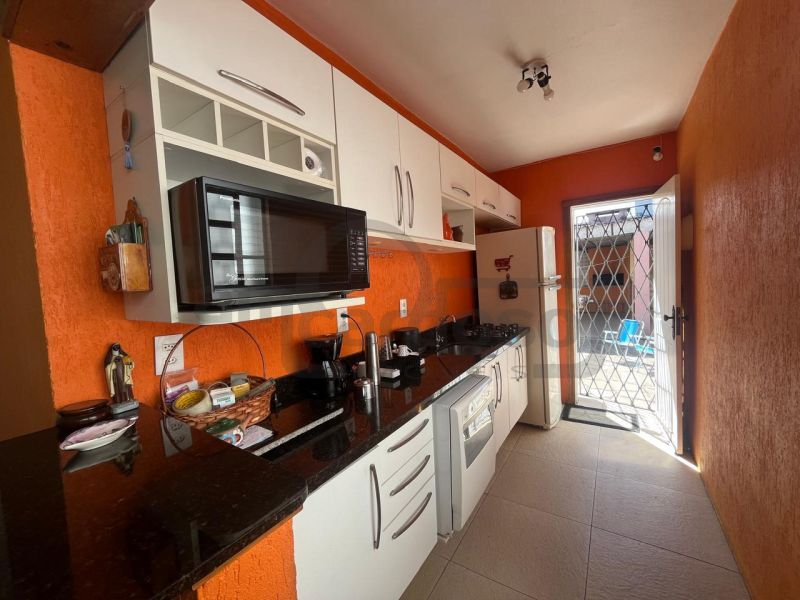 CASA TÉRREA COM 3 DORMITÓRIOS, SUÍTE E AMPLO ESPAÇO GOURMET NO BAIRRO SÃO SEBASTIÃO