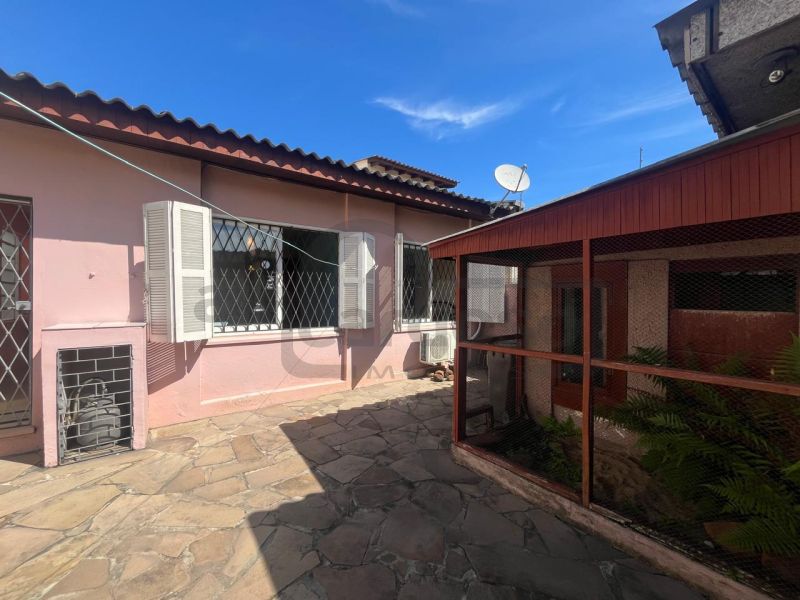 CASA TÉRREA COM 3 DORMITÓRIOS, SUÍTE E AMPLO ESPAÇO GOURMET NO BAIRRO SÃO SEBASTIÃO