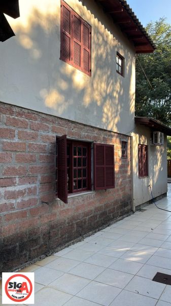 Casa com 3 quartos, 4 banheiros e 190m² à venda no bairro Chácara das Rosas, Cachoeirinha