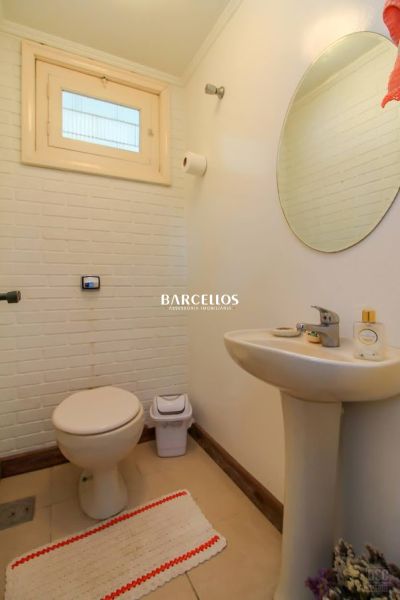 Casa com 3 quartos, 4 banheiros e 280m² à venda no bairro Ipanema, Porto Alegre