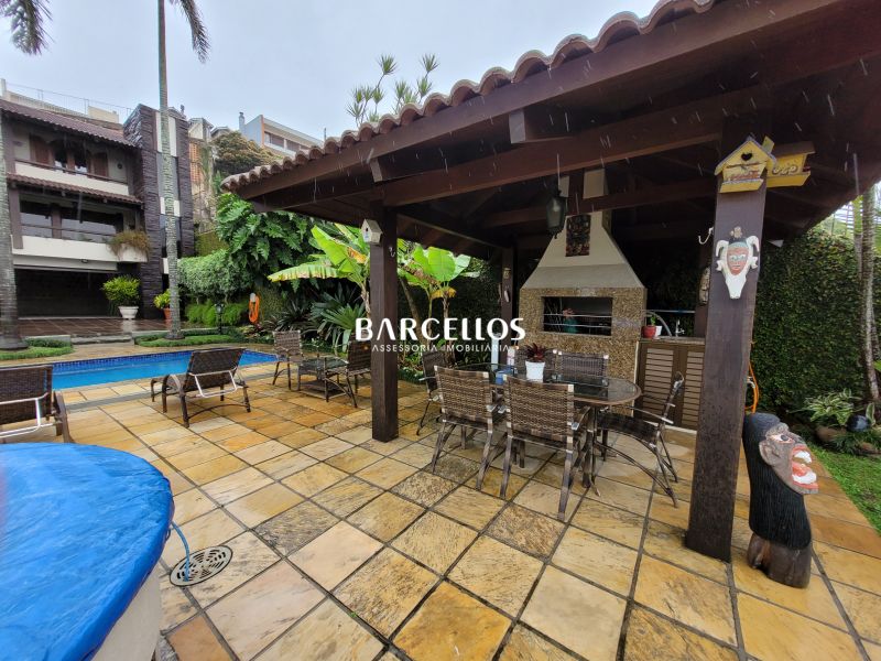 Casa com 3 quartos, 4 banheiros e 430m² à venda no bairro Vila Assuncao, Porto Alegre