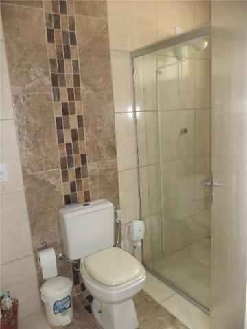 Casa com 4 quartos, 2 banheiros e 219m² à venda no bairro Centro, Pelotas