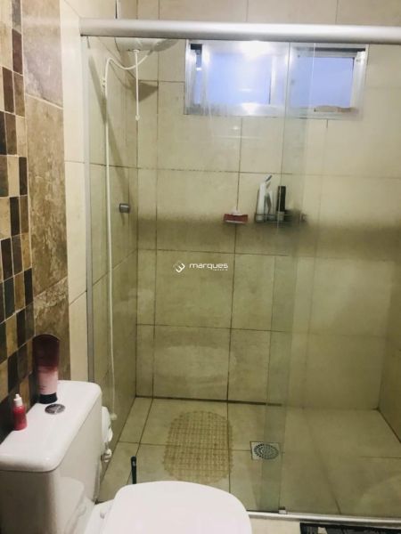 Casa com 4 quartos, 2 banheiros e 219m² à venda no bairro Centro, Pelotas