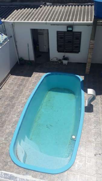 Casa com 2 quartos, 2 banheiros e 140m² à venda no bairro Laranjal, Pelotas