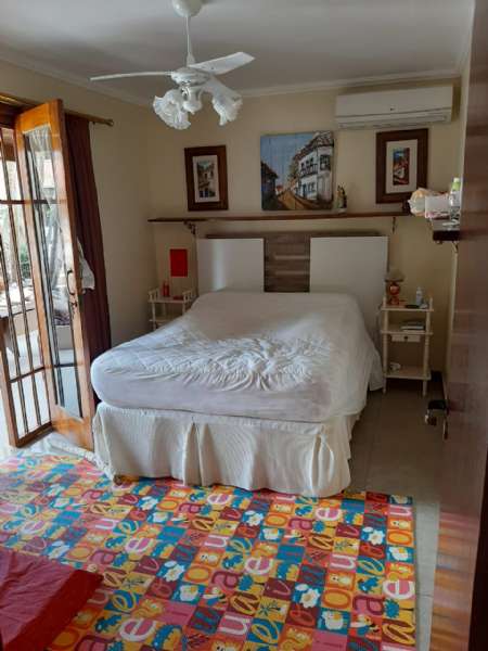 Sobrado com 5 quartos, 6 banheiros e 431m² à venda no bairro Laranjal, Pelotas