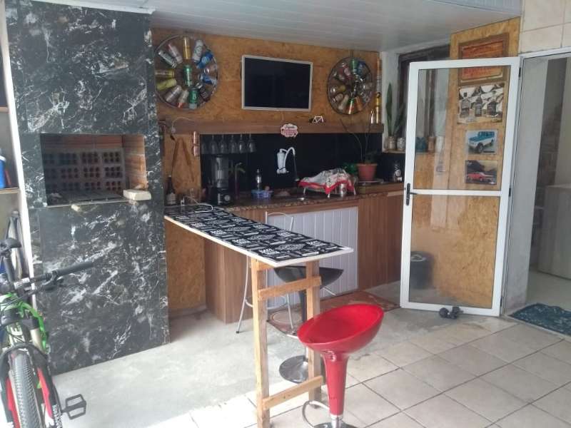 Casa com 3 quartos, 2 banheiros e 145m² à venda no bairro Areal, Pelotas