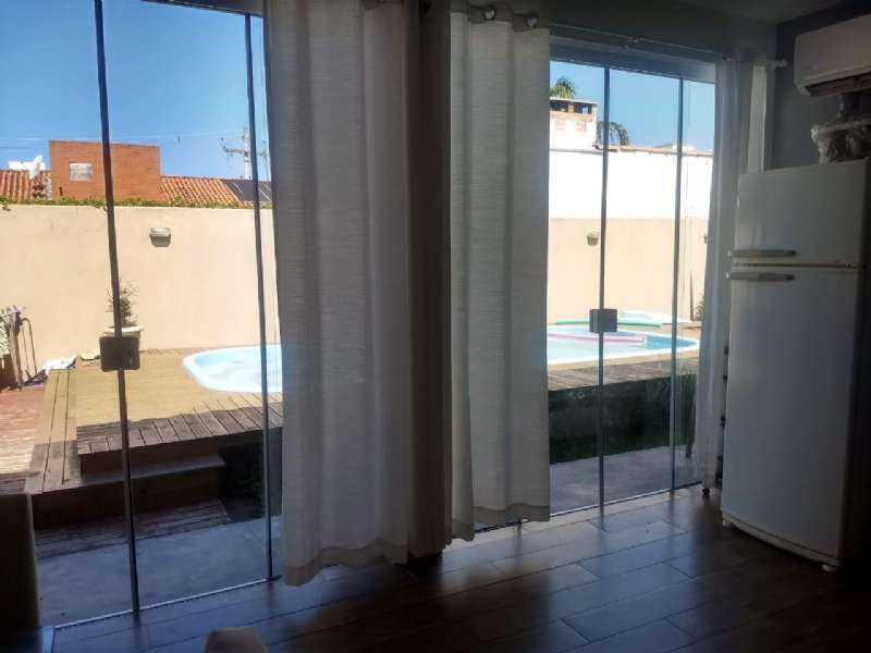 Casa com 3 quartos, 2 banheiros e 160m² à venda no bairro Recanto de Portugal, Pelotas