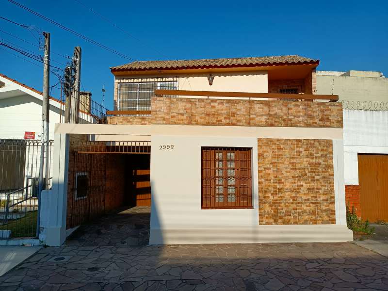 Casa com 4 quartos, 5 banheiros e 254m² à venda no bairro Centro, Pelotas