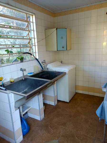 Casa com 4 quartos, 5 banheiros e 254m² à venda no bairro Centro, Pelotas