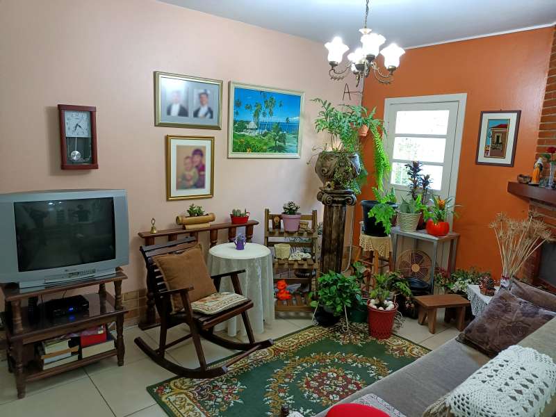 Casa com 4 quartos, 5 banheiros e 254m² à venda no bairro Centro, Pelotas