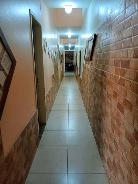 Casa com 4 quartos, 5 banheiros e 254m² à venda no bairro Centro, Pelotas