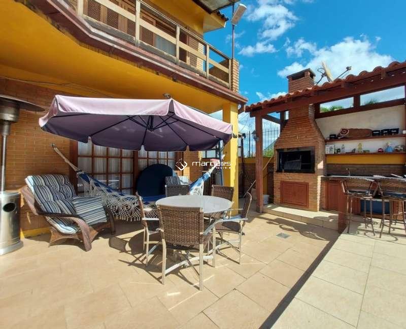 Casa com 4 quartos, 4 banheiros e 360m² à venda no bairro Três Vendas, Pelotas