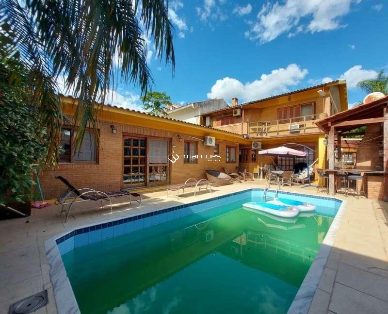 Casa com 4 quartos, 4 banheiros e 360m² à venda no bairro Três Vendas, Pelotas