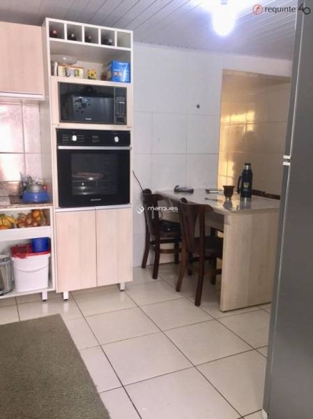 Casa com 3 quartos, 3 banheiros e 145m² à venda no bairro Centro, Pelotas