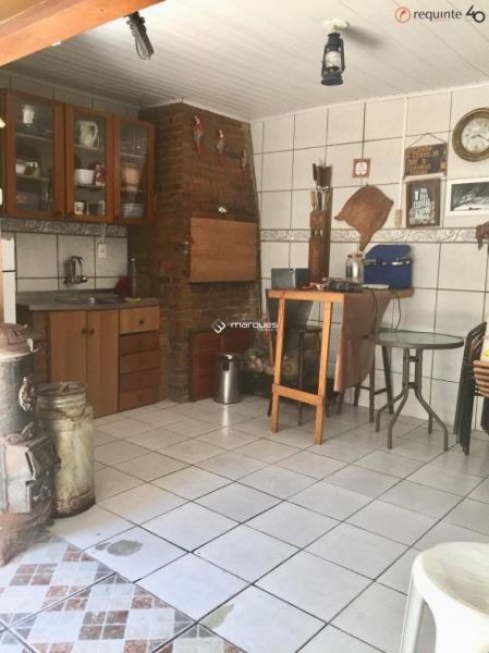 Casa com 3 quartos, 3 banheiros e 145m² à venda no bairro Centro, Pelotas