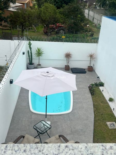 Casa com 3 quartos, 2 banheiros e 115m² à venda no bairro Las Acácias, Pelotas